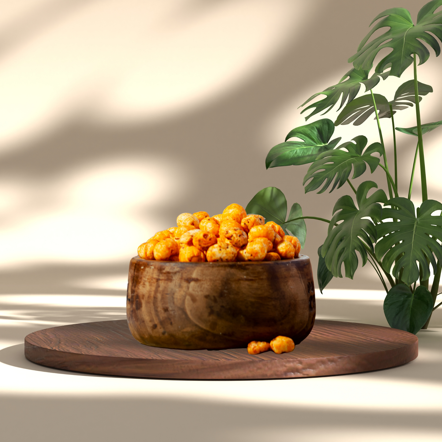 Lemon Chilli Makhana - Tangy Spicy Healthy snack served in a wooden bowl on a wooden board with green leaves background