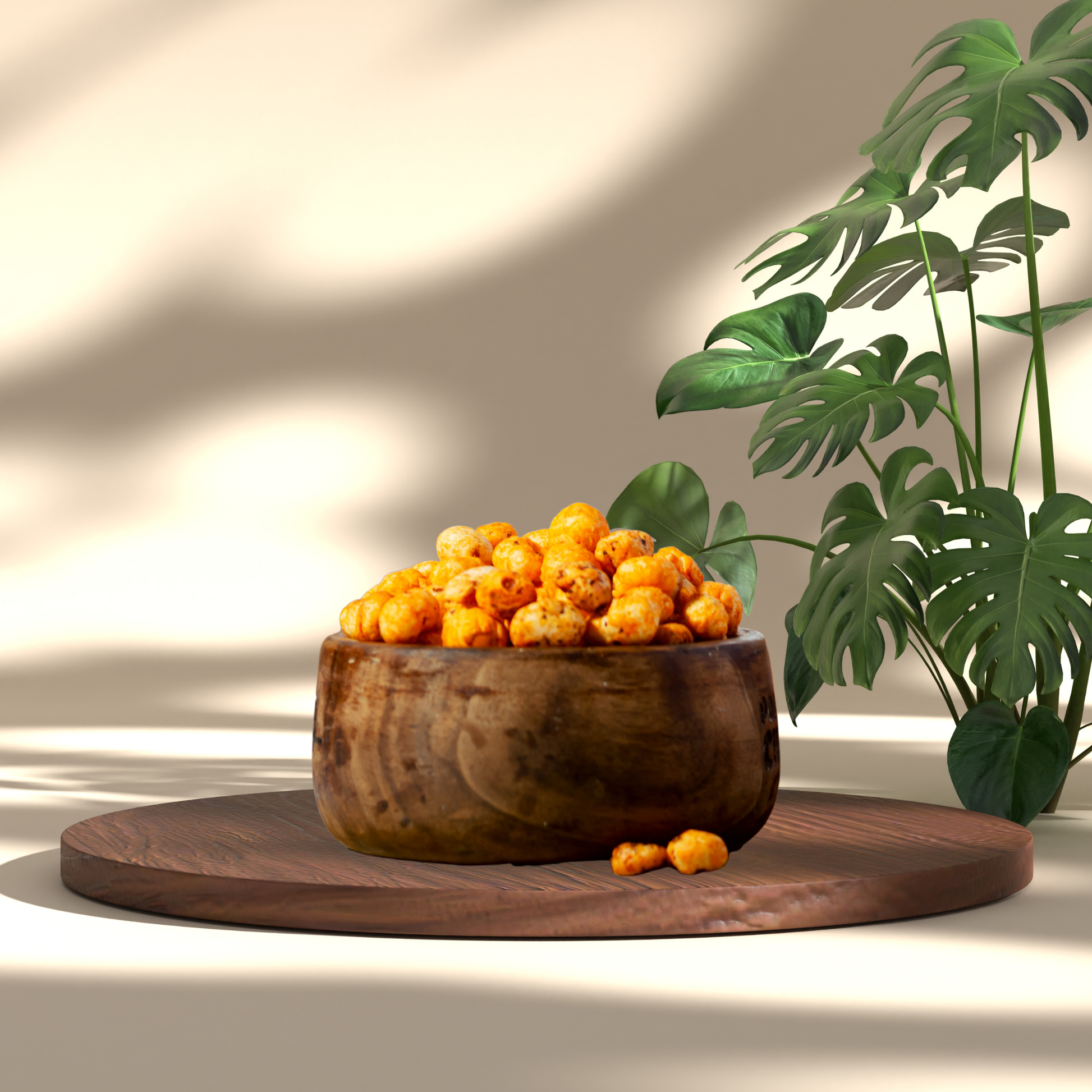Lemon Chilli Makhana - Tangy Spicy Healthy snack served in a wooden bowl on a wooden board with green leaves background